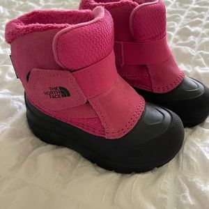 The North Face snow boots toddler size 8.